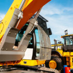 Paris,,France,-,Sep,5,,2014:,Yellow,Liebherr,Excavator,And