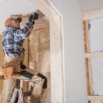 General,Construction,Contractor,Attaching,Drywall,Using,Cordless,Drill,Driver.,Caucasian